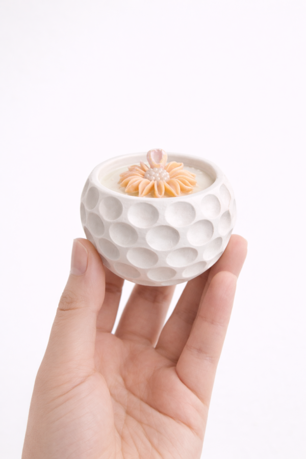 vela aromatica con recipiente artesanal