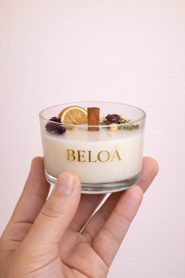 vela aromática vaso con flores